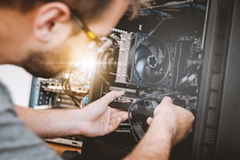 Person working on computer case