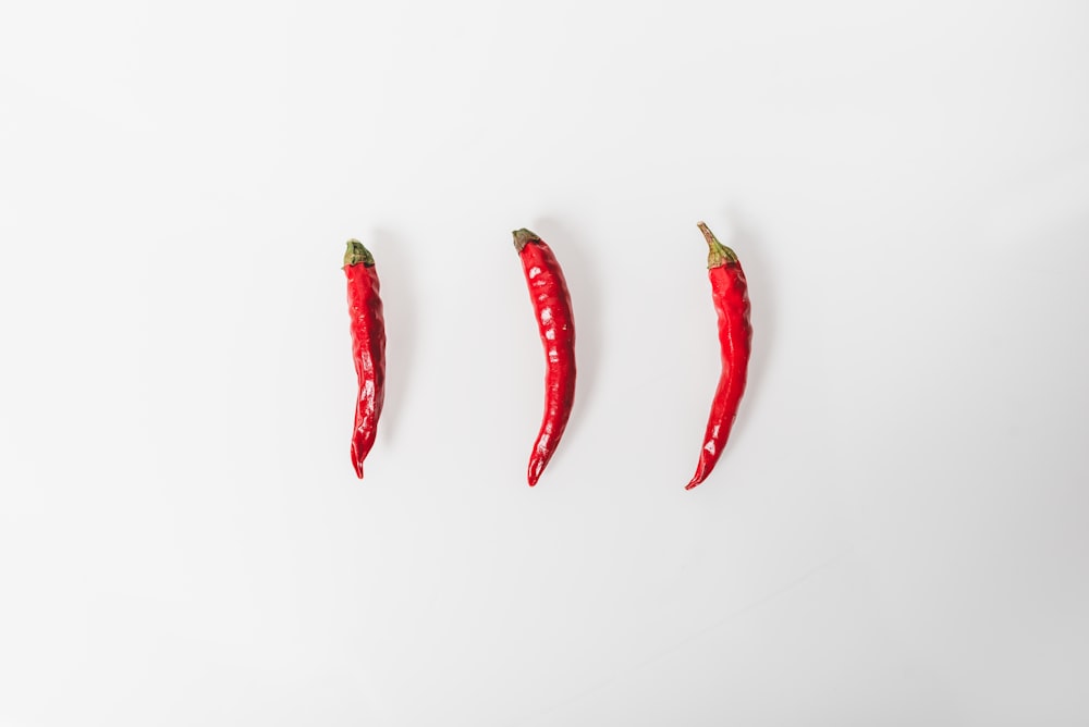 red chili on white surface
