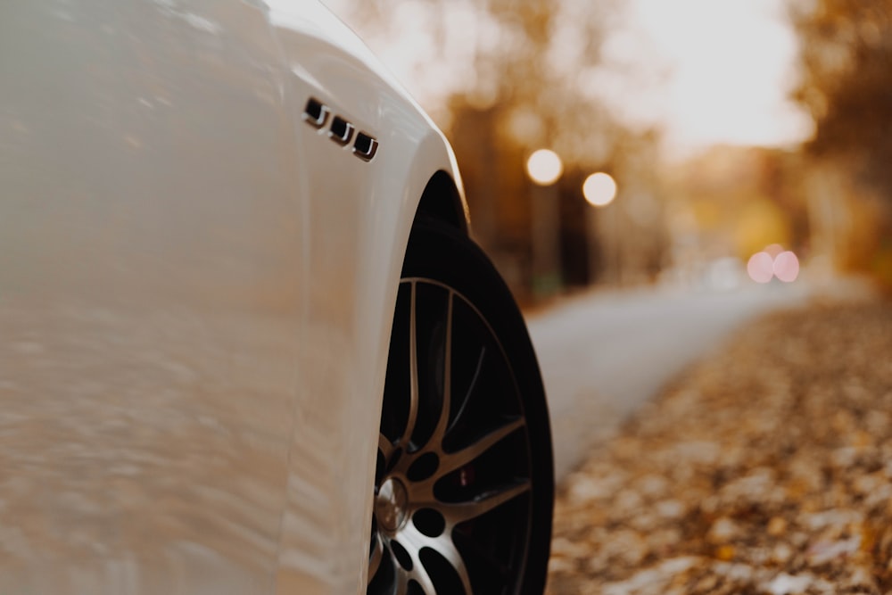 white car on road during daytime