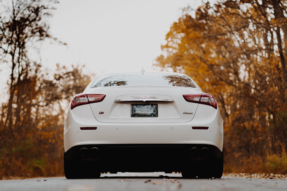 white car on road during daytime