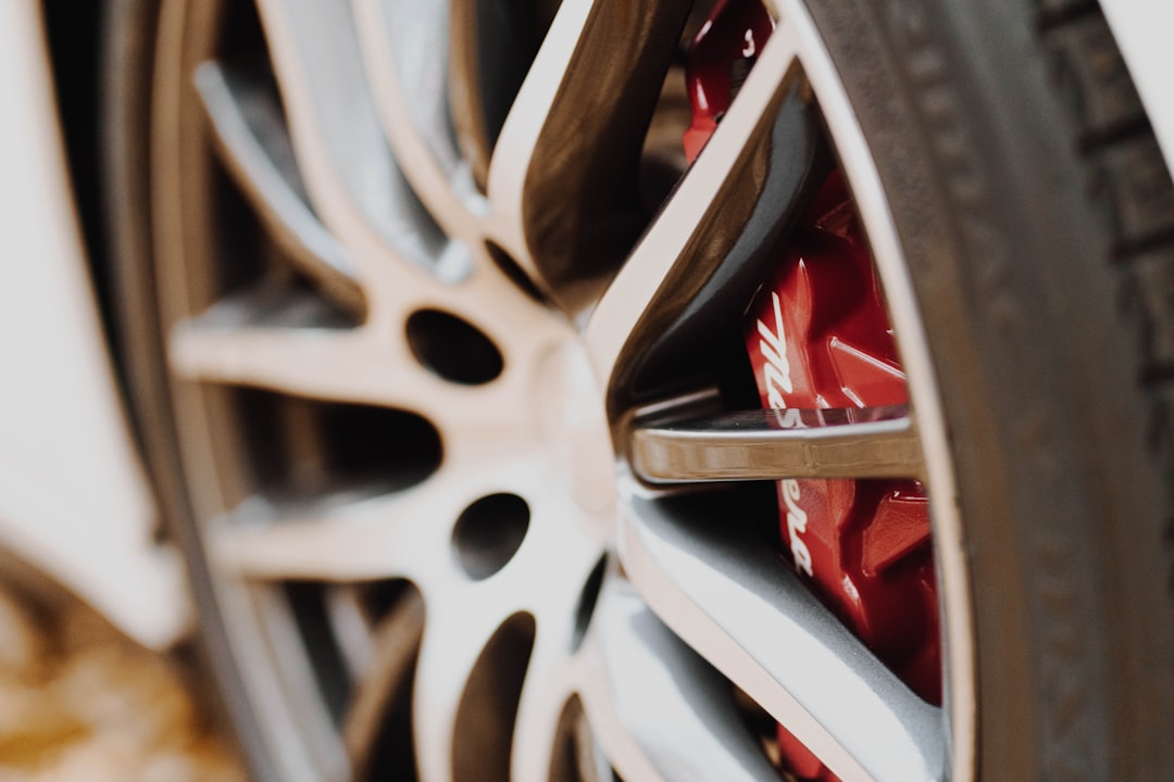 silver and red car wheel