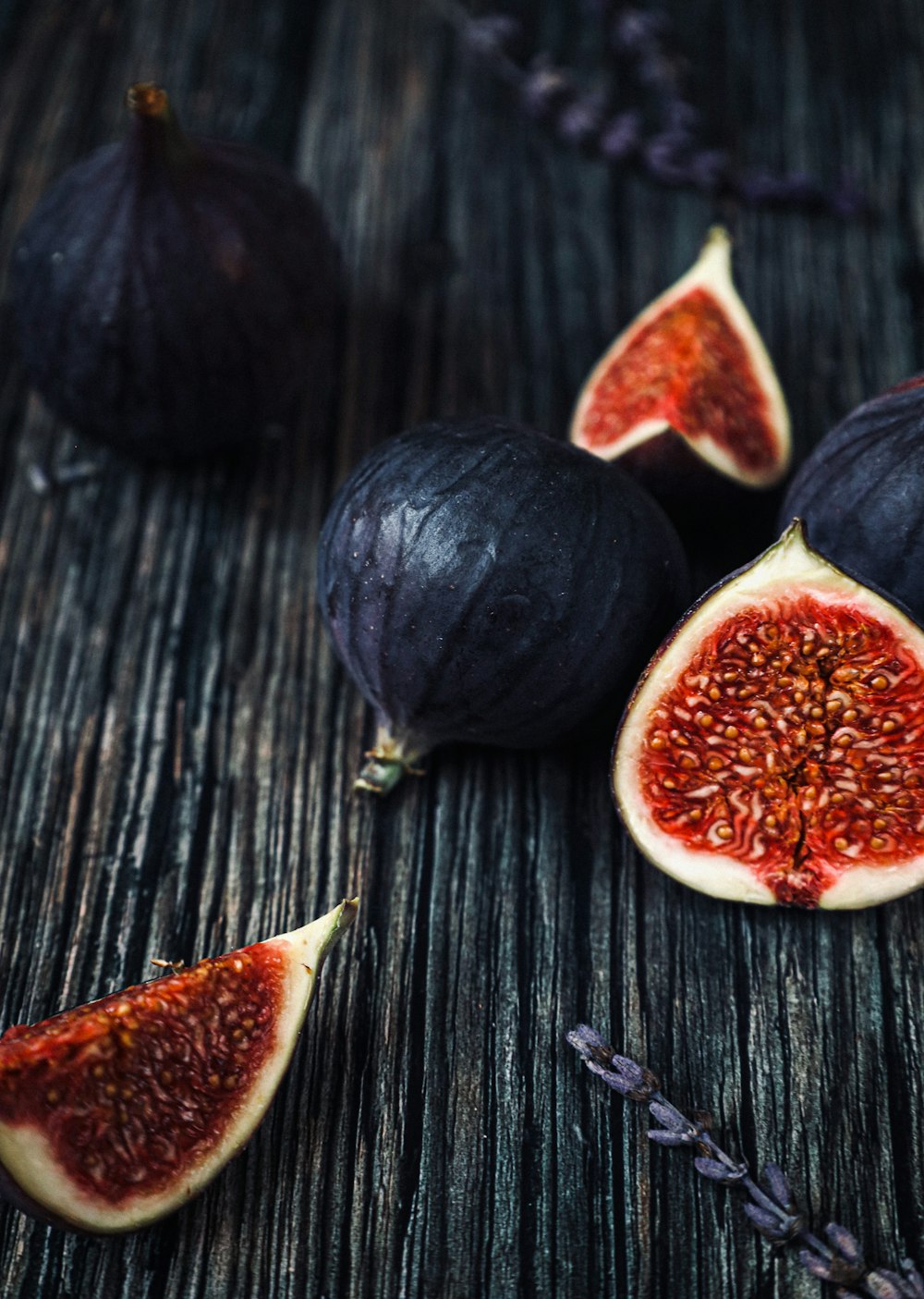 black round fruit on black wooden table