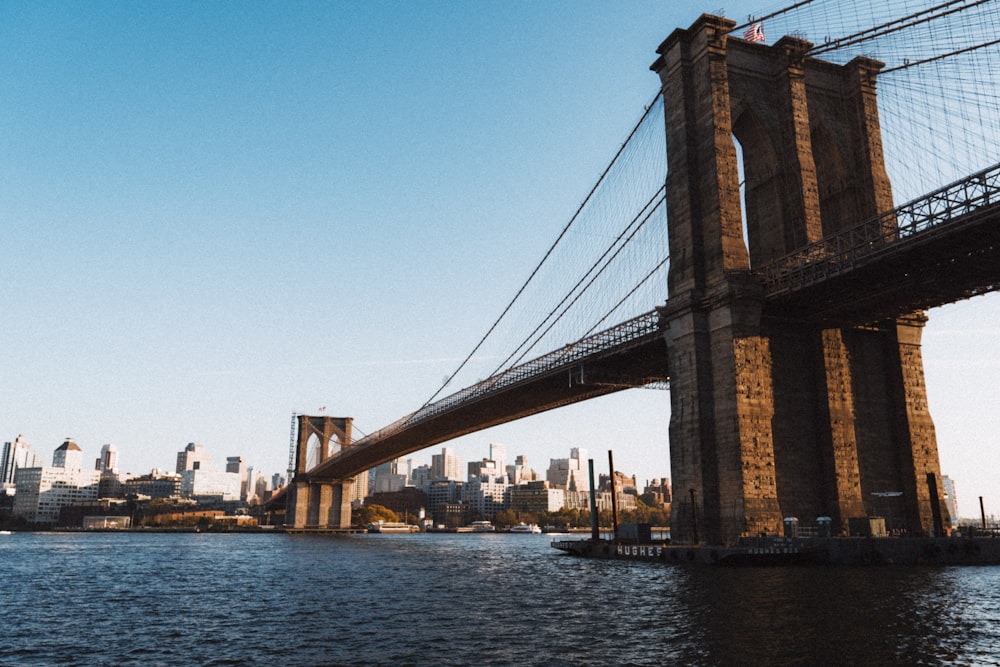 brown bridge under blue sky during daytime