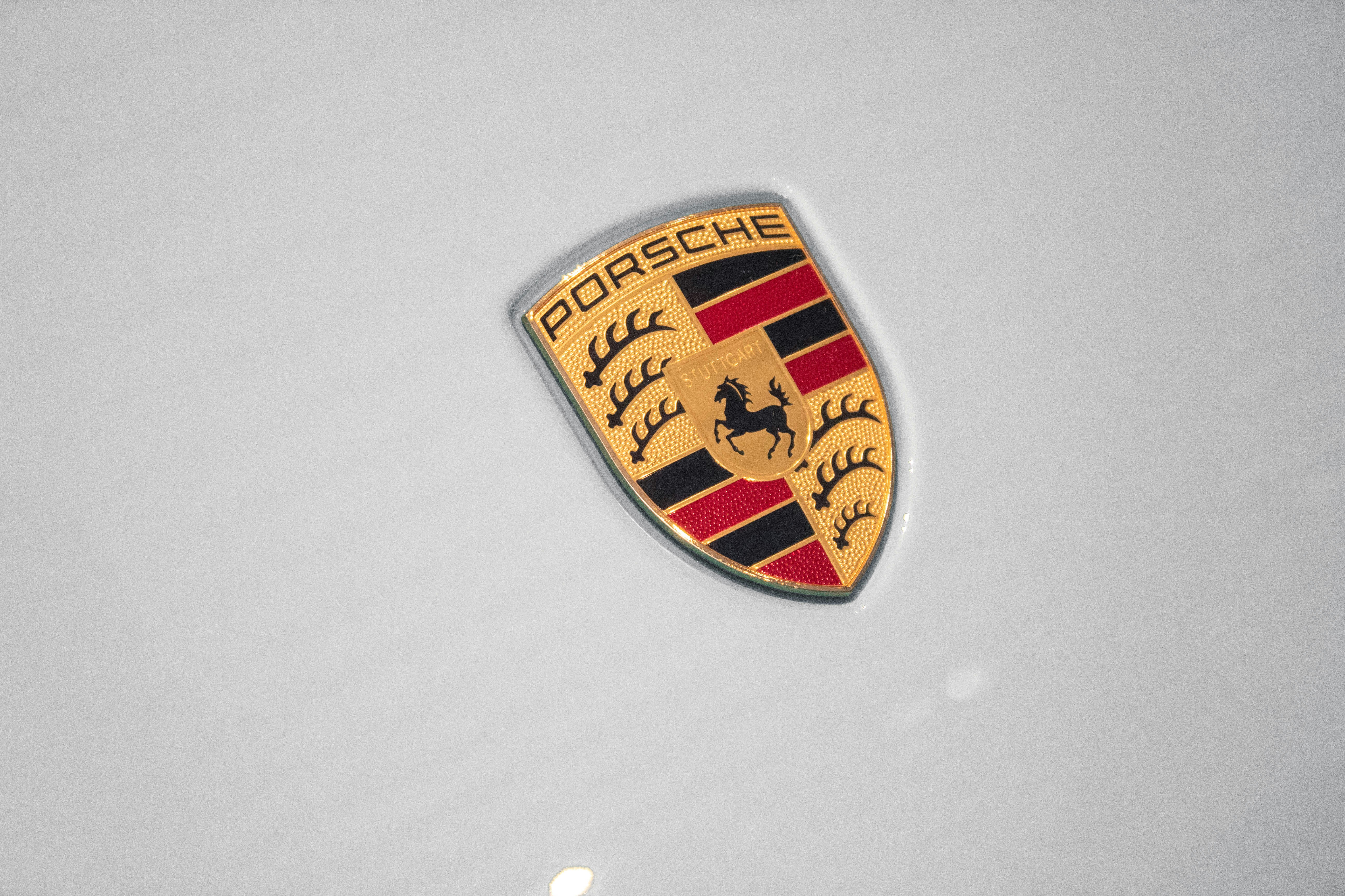 Porsche crest logo featuring Stuttgart coat of arms and racing heritage