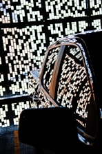 A shiny car coated with ceramic protection reflecting the bright Dubai skyline.
