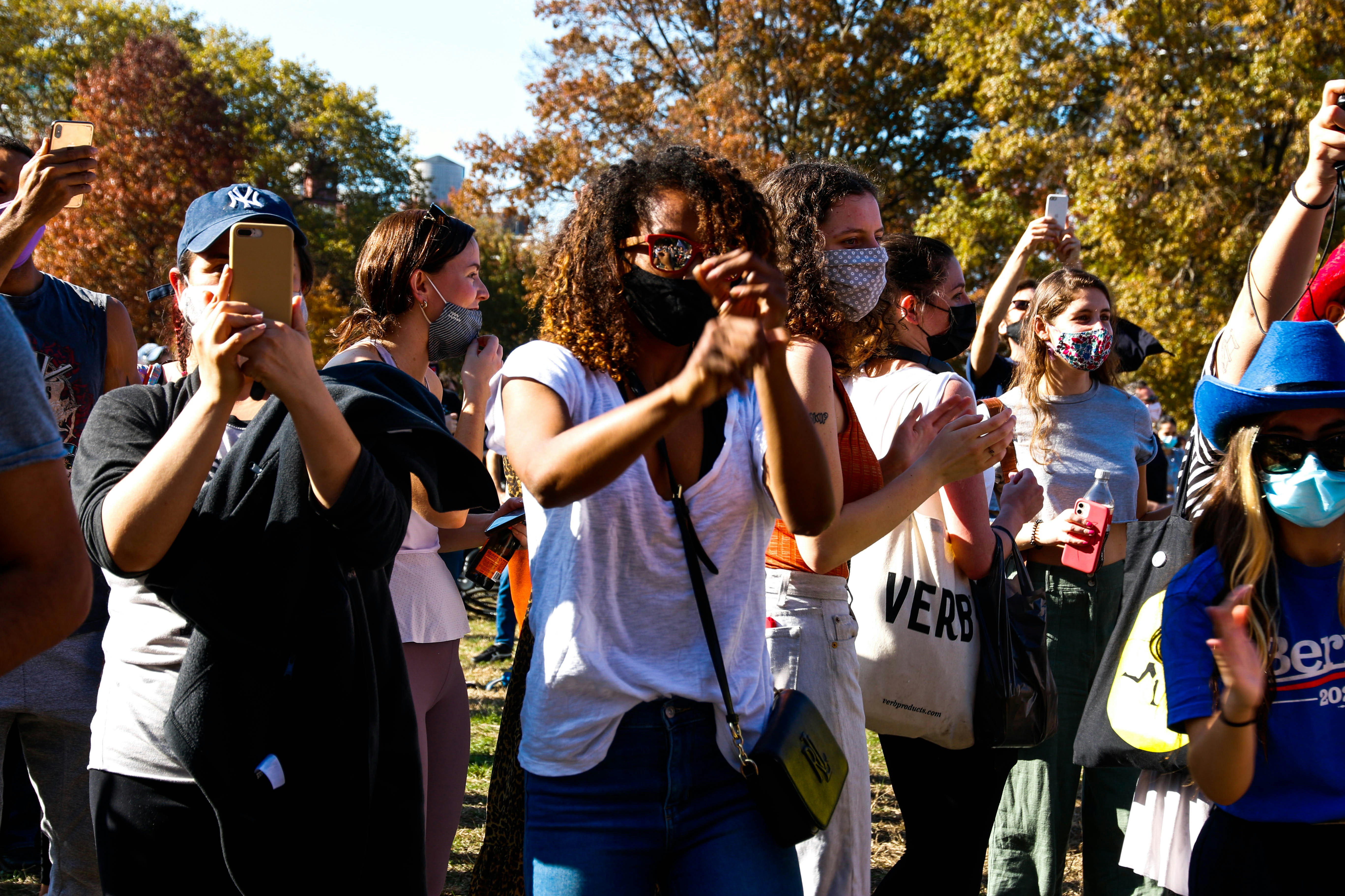 people standing and smiling during daytime