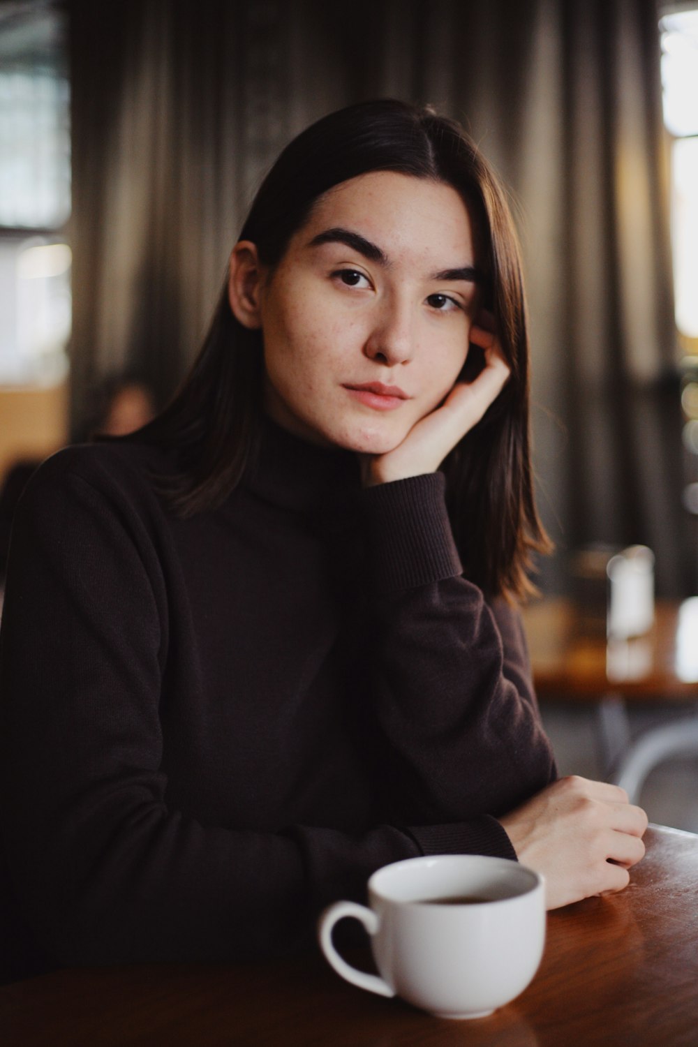 woman in black long sleeve shirt