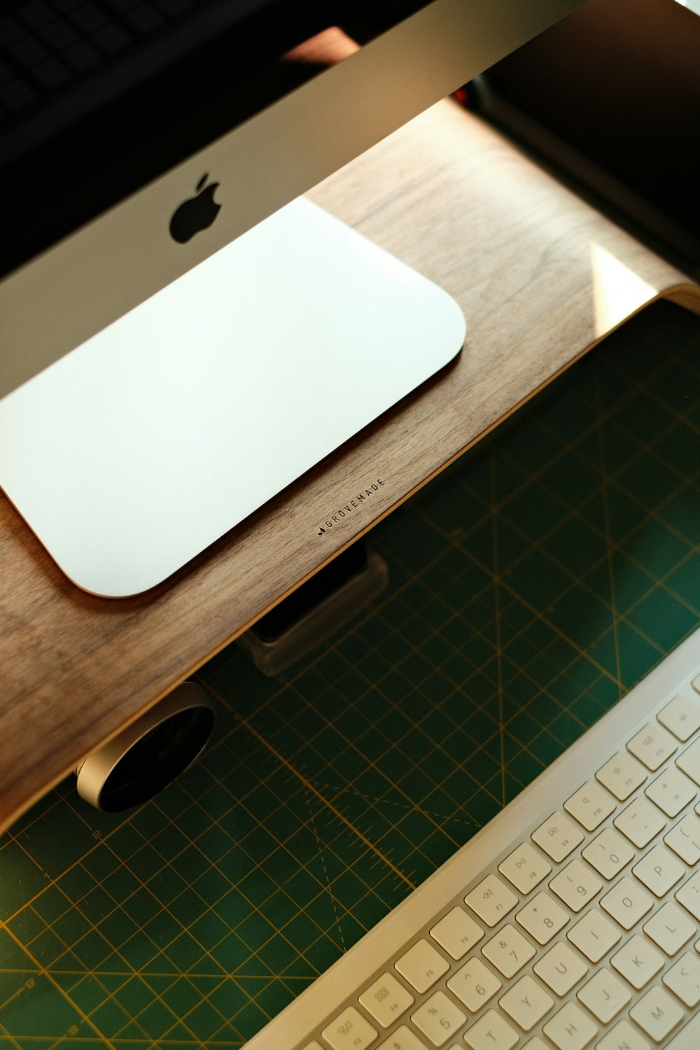 white apple magic keyboard on brown wooden table