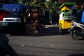 Seven Cart team setting up a colorful food cart at a lively community event.