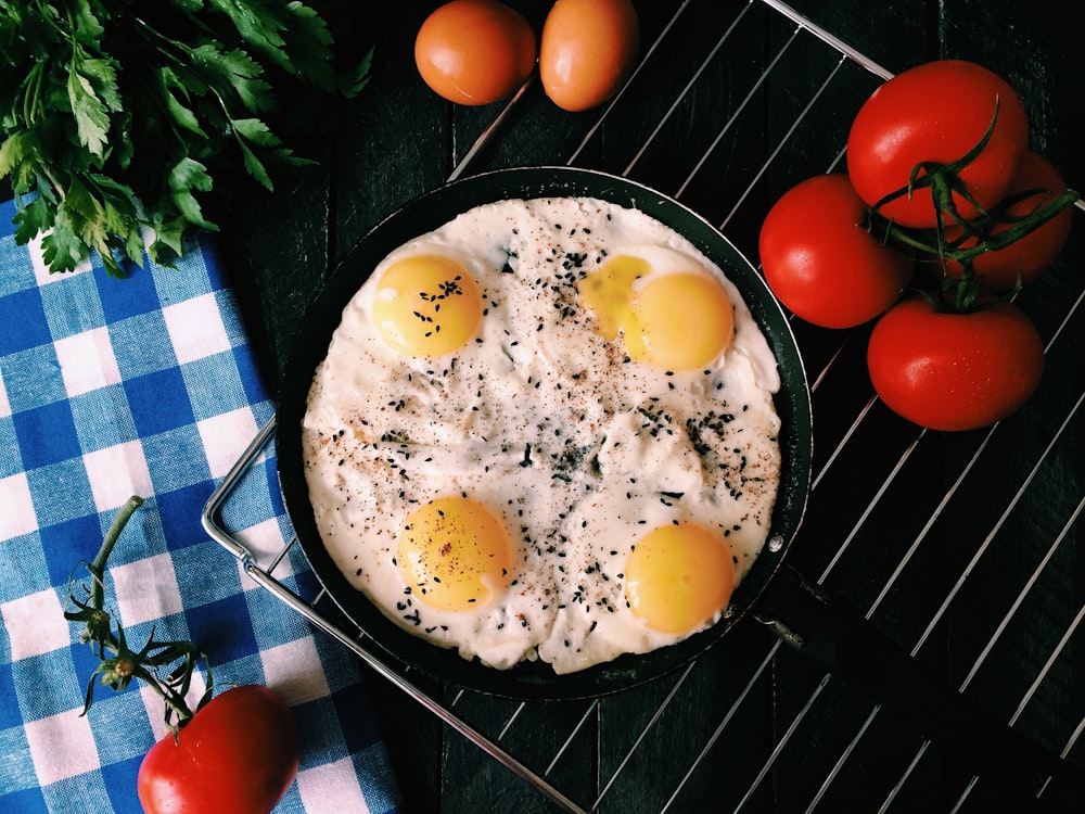 sunny side up egg on black pan