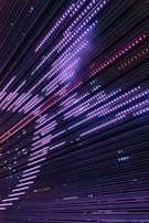 A high-resolution waveform display with parallax effect, glowing softly in royal purple hues.