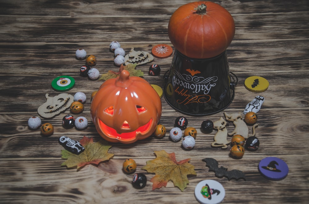 pumpkin on black and brown wooden table