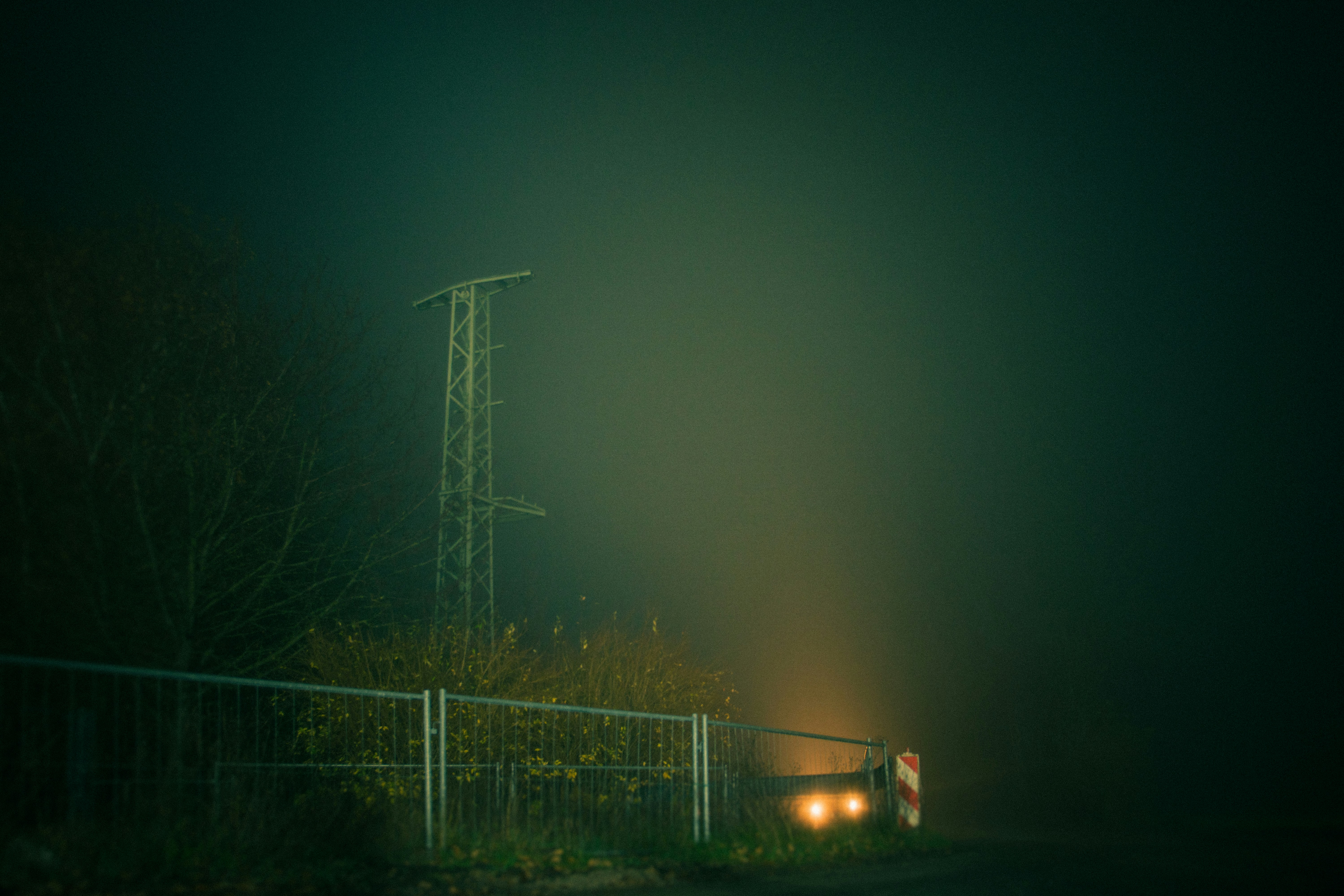 white electric tower during night time