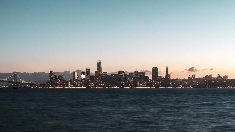 city skyline under blue sky during daytime