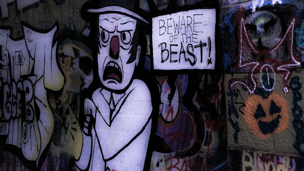 black and white man with black hair and mustache wall graffiti