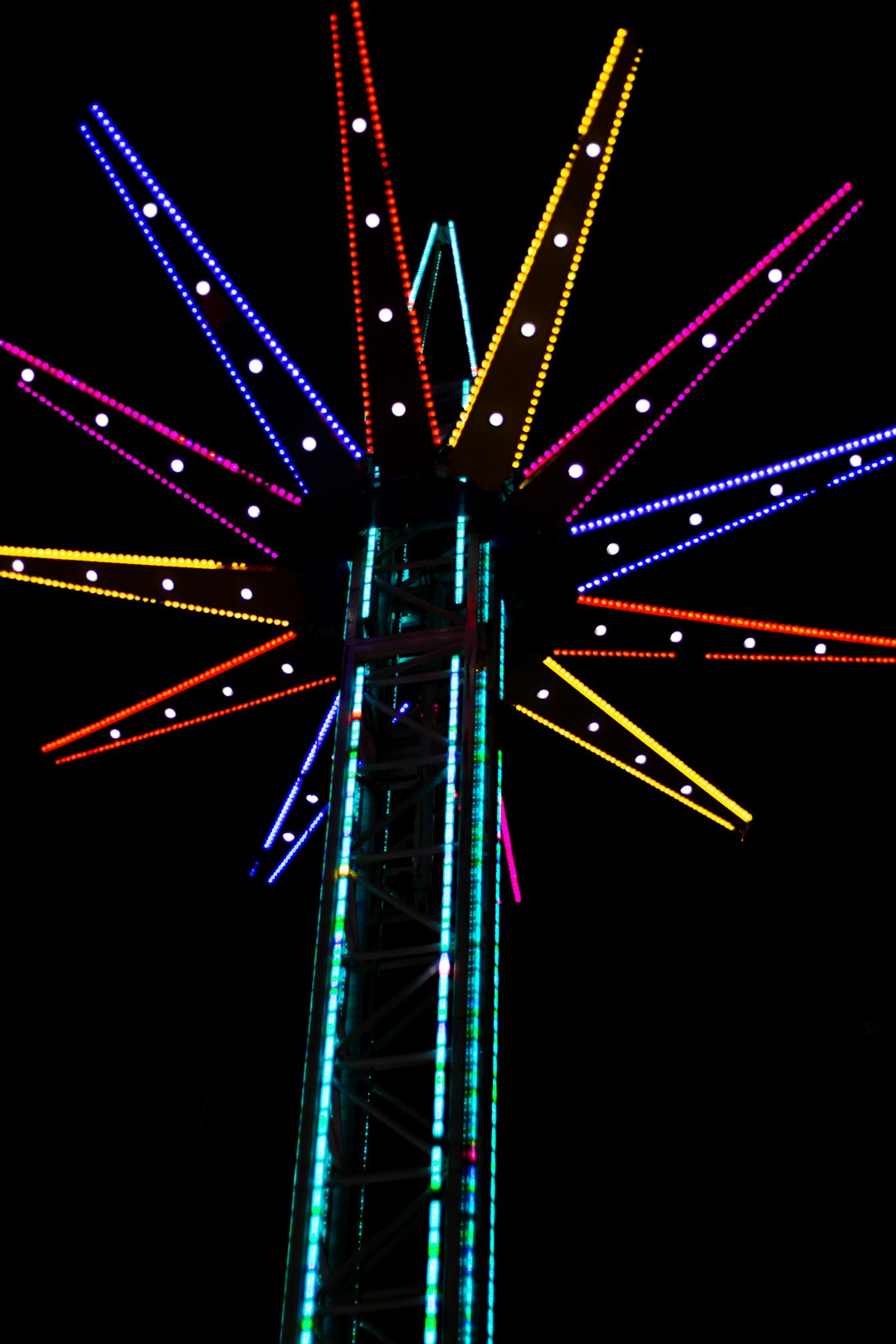 purple and blue ferris wheel during night time