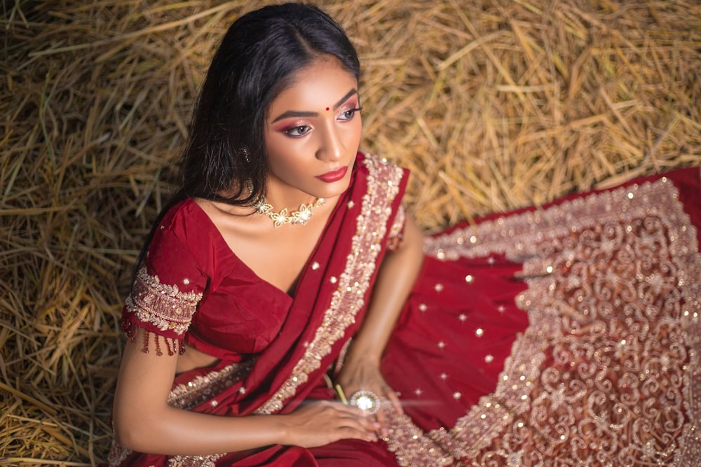 woman in red and white floral sari dress