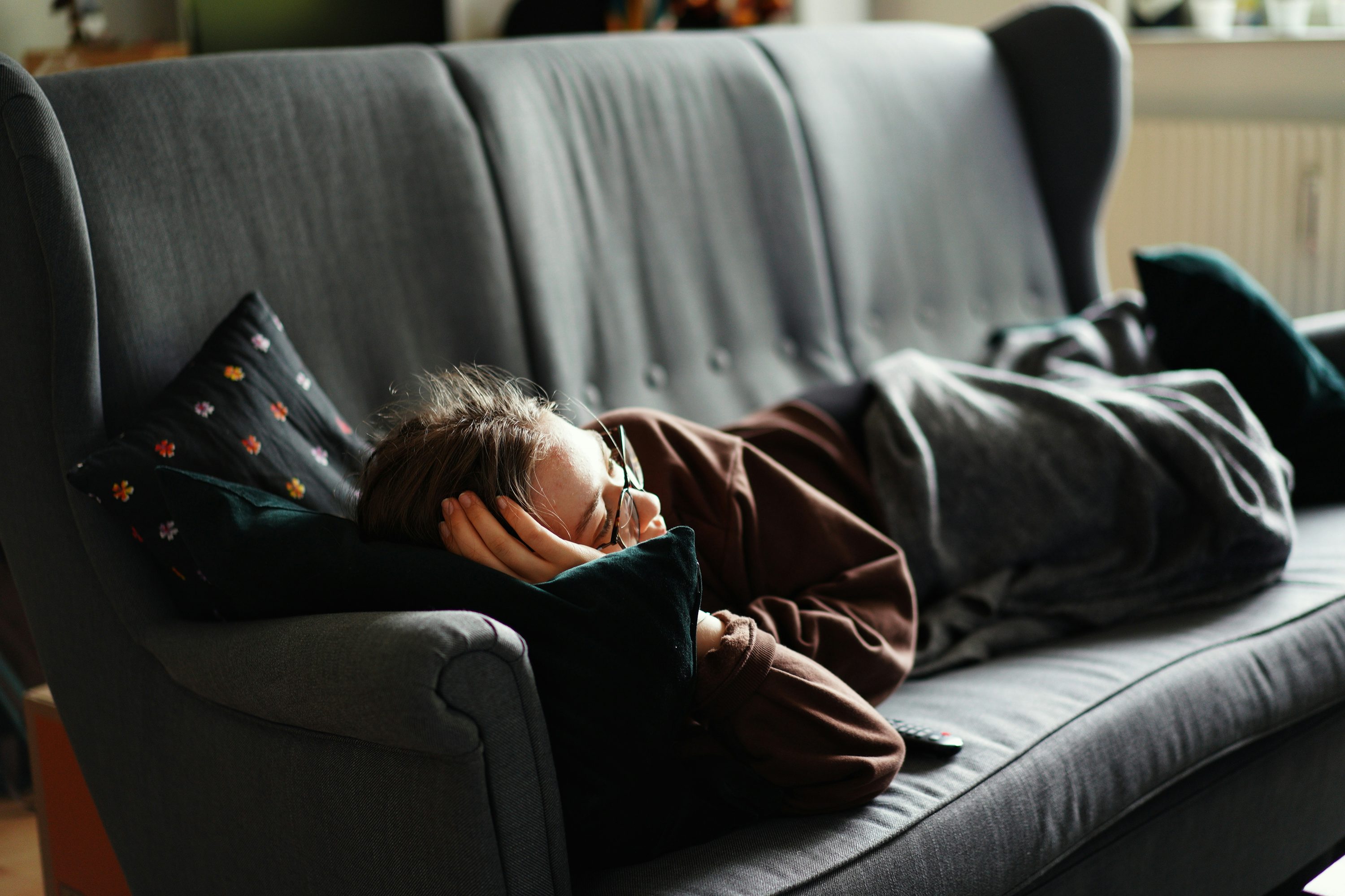 Person relaxing watching TV