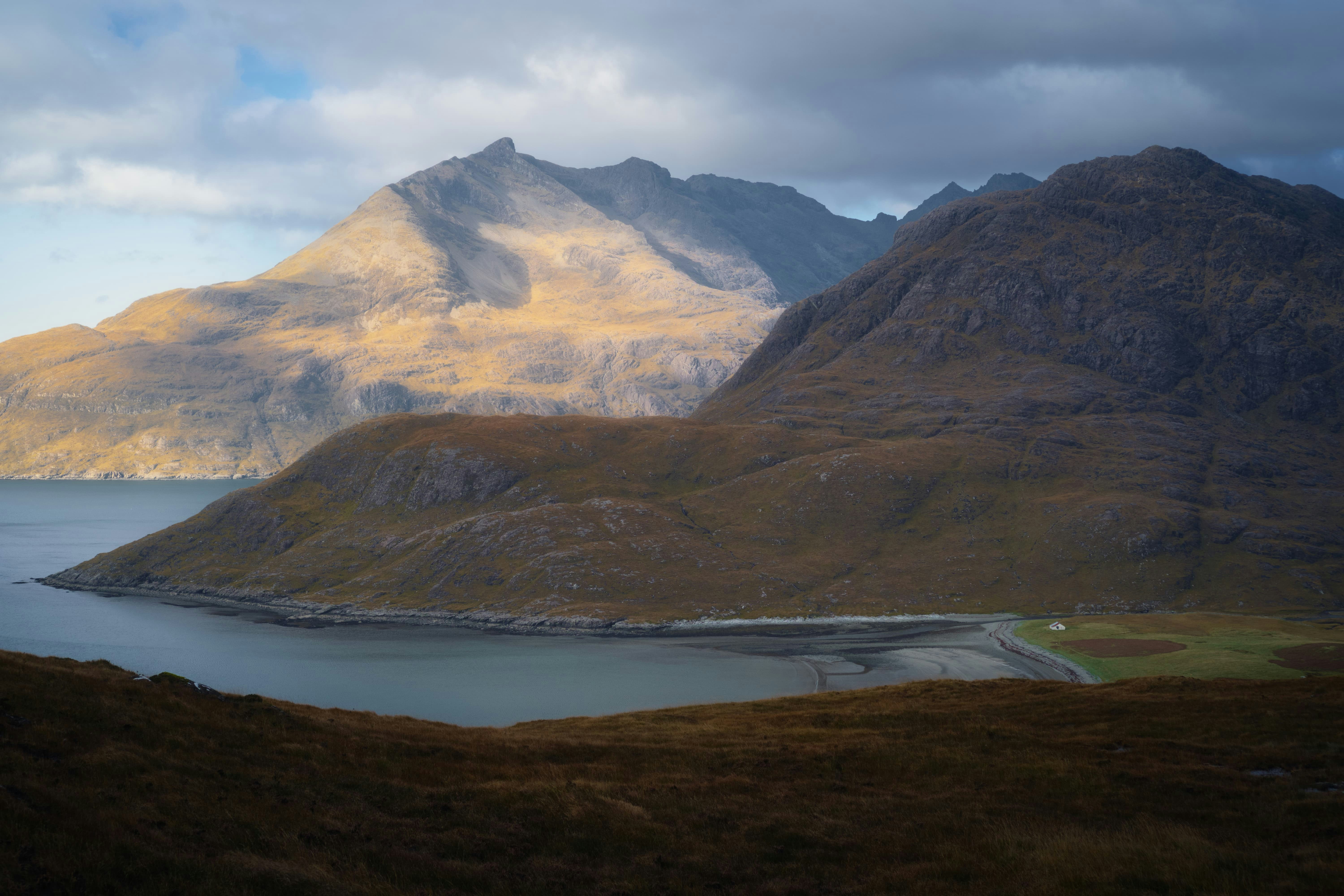 The view of Camasunary Bay from the summit of the trail. Holy moly, what a view! The mountain to the right is Sgurr na Stri (494 m/1,620 ft), definitely one of the smaller peaks on Skye but its position above Loch Coruisk means the view from its summit is perhaps one of the finest in Britain (and one I hope to see myself one day). To the left, catching the morning light, is Gars-bheinn (808 m/2,650 ft).