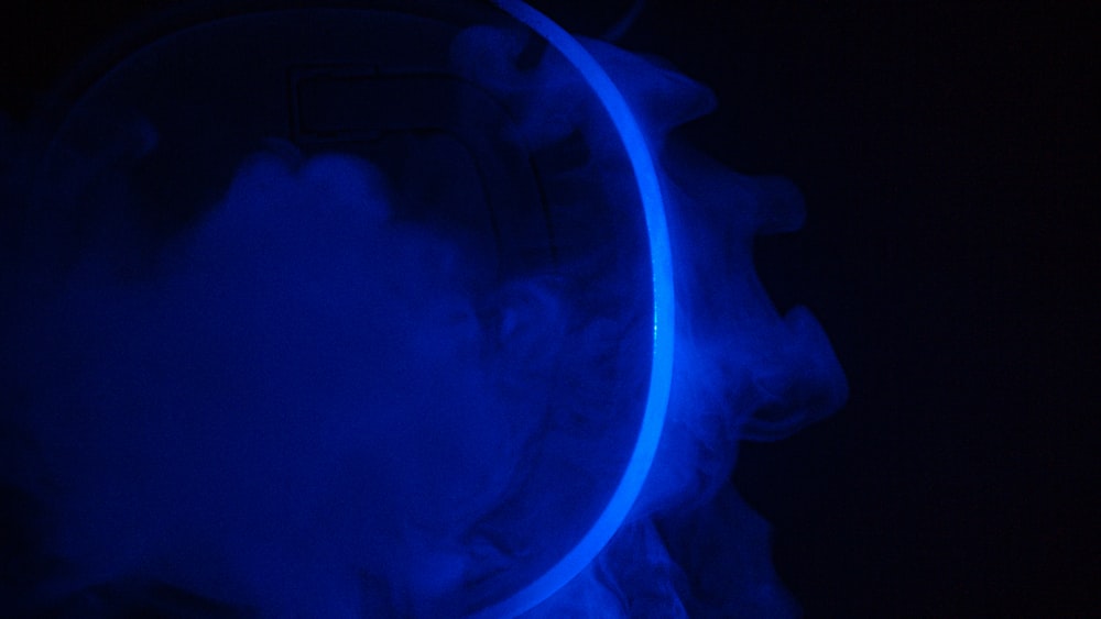 blue smoke in a dark room