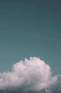 A serene, cloud-filled sky symbolizing secure data storage in the cloud.