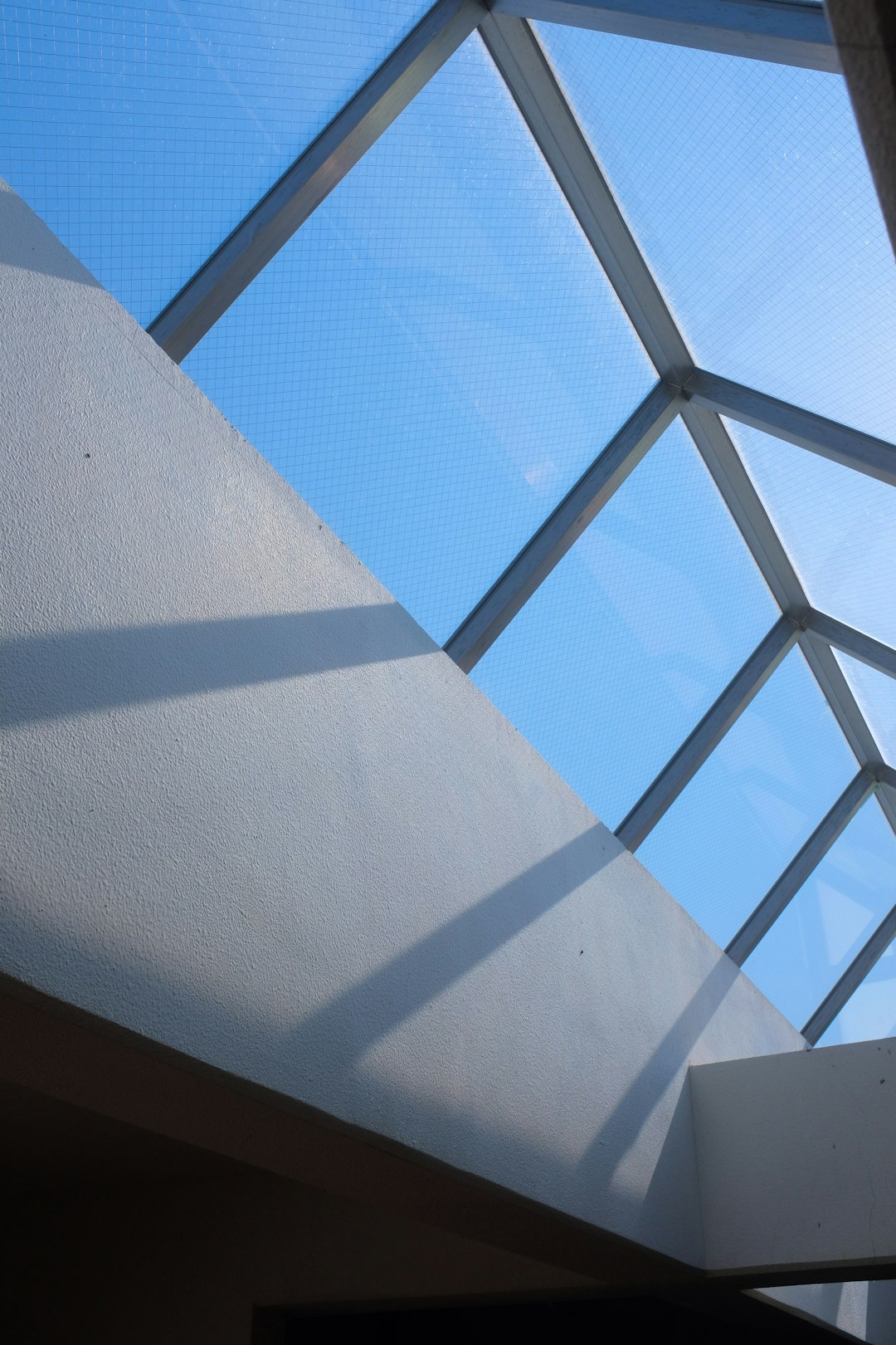 white and blue glass roof