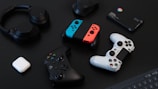 white and orange game controller