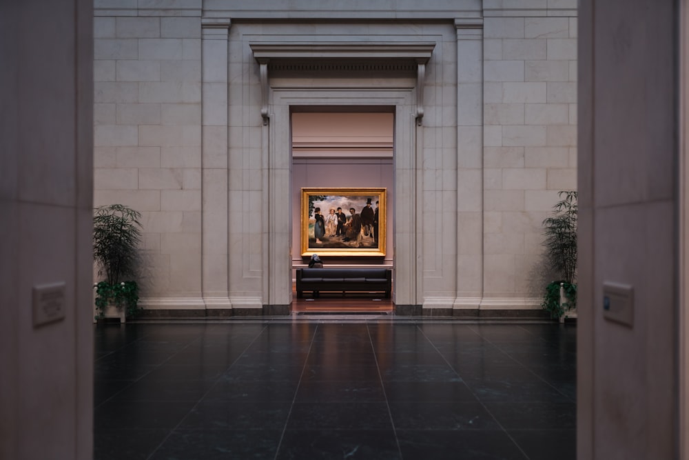 black fireplace in front of white concrete building