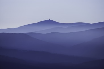 black mountain under white sky during daytime