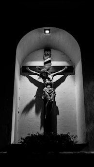 black and white statue of a man