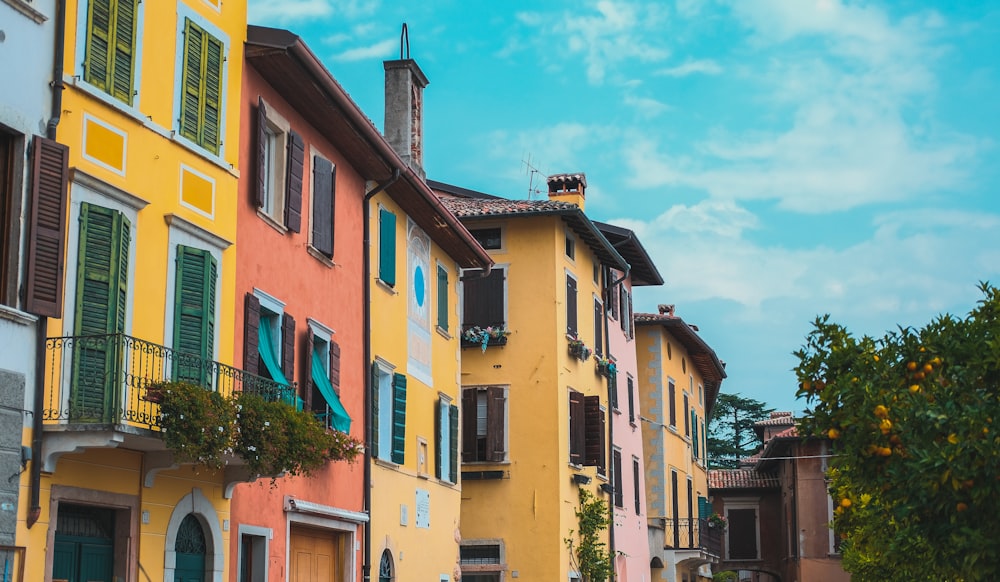 yellow and red concrete buildings during daytime