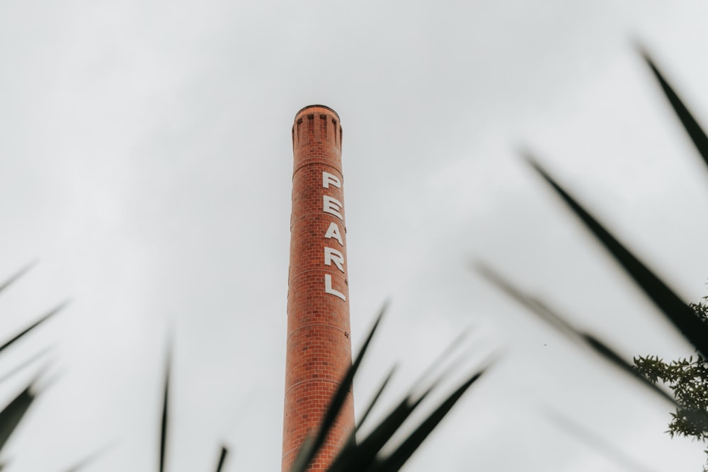 orange and white metal tube