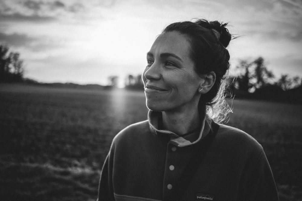 grayscale photo of woman in black cardigan