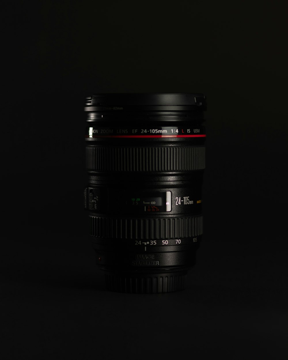 black camera lens on black background