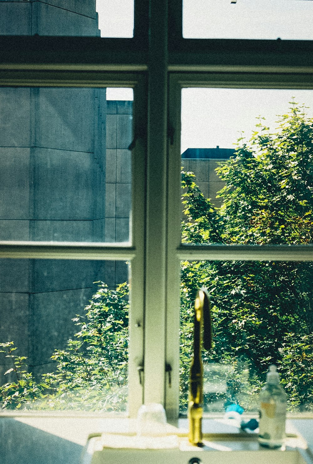 white wooden framed glass window