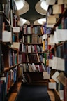 books on brown wooden shelf