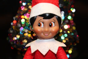 boy in red and white santa hat