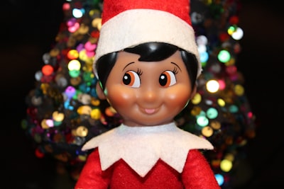 boy in red and white santa hat