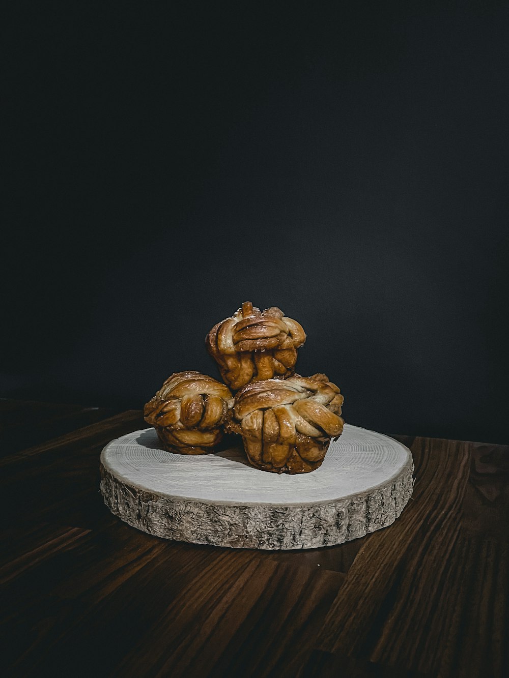 brown wooden figurine on brown wooden table