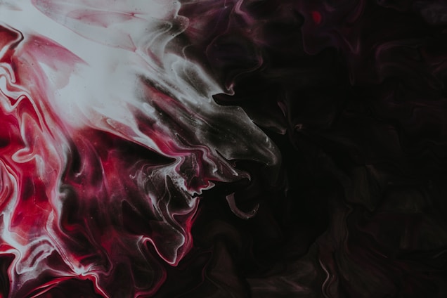 A haunting, abstract image swirling with dark reds and blacks, evoking the torment of a fractured mind.