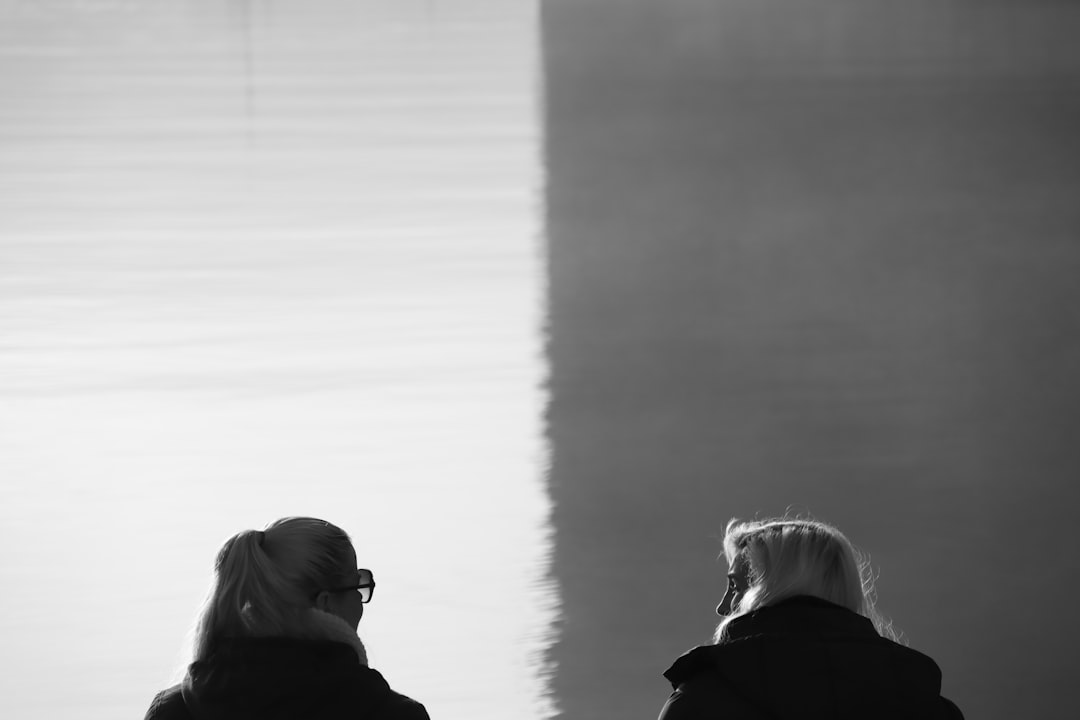 grayscale photo of woman and girl, Chatting