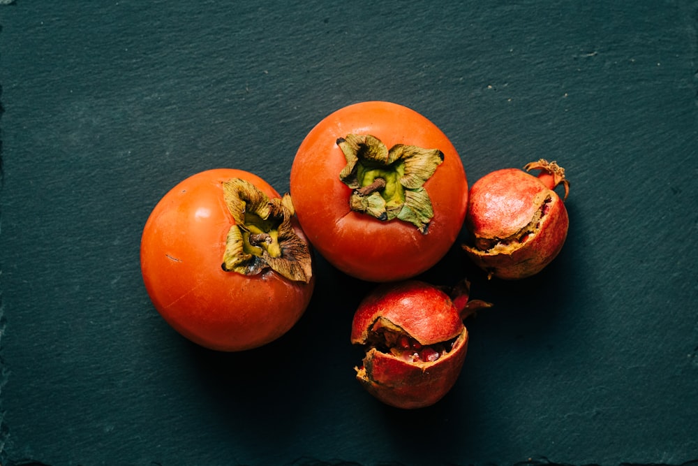 red tomato on black textile