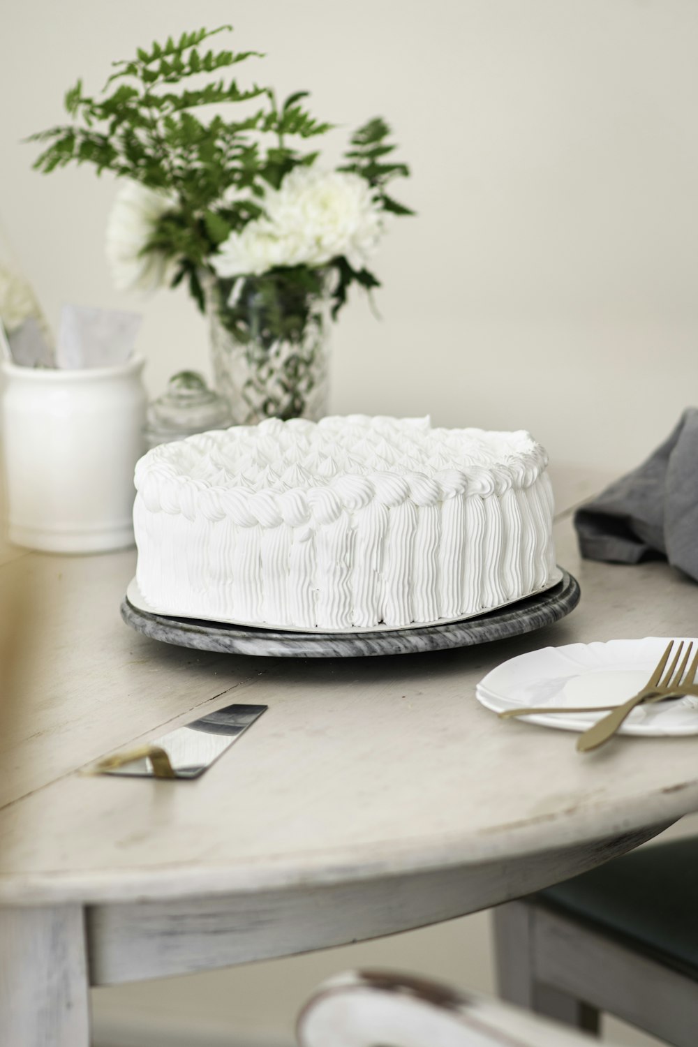 white cake on white ceramic plate