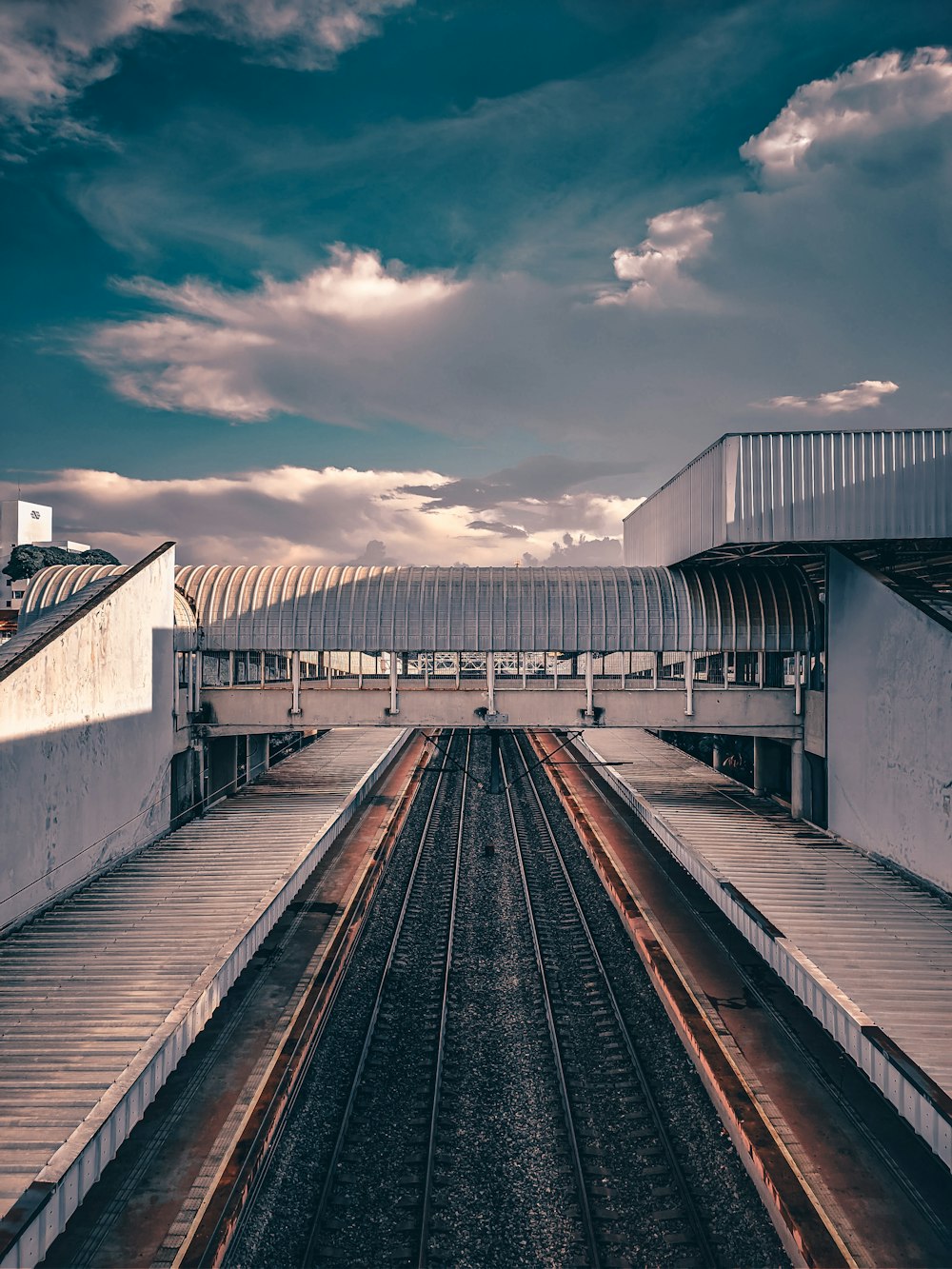 white concrete building under cloudy sky during daytime