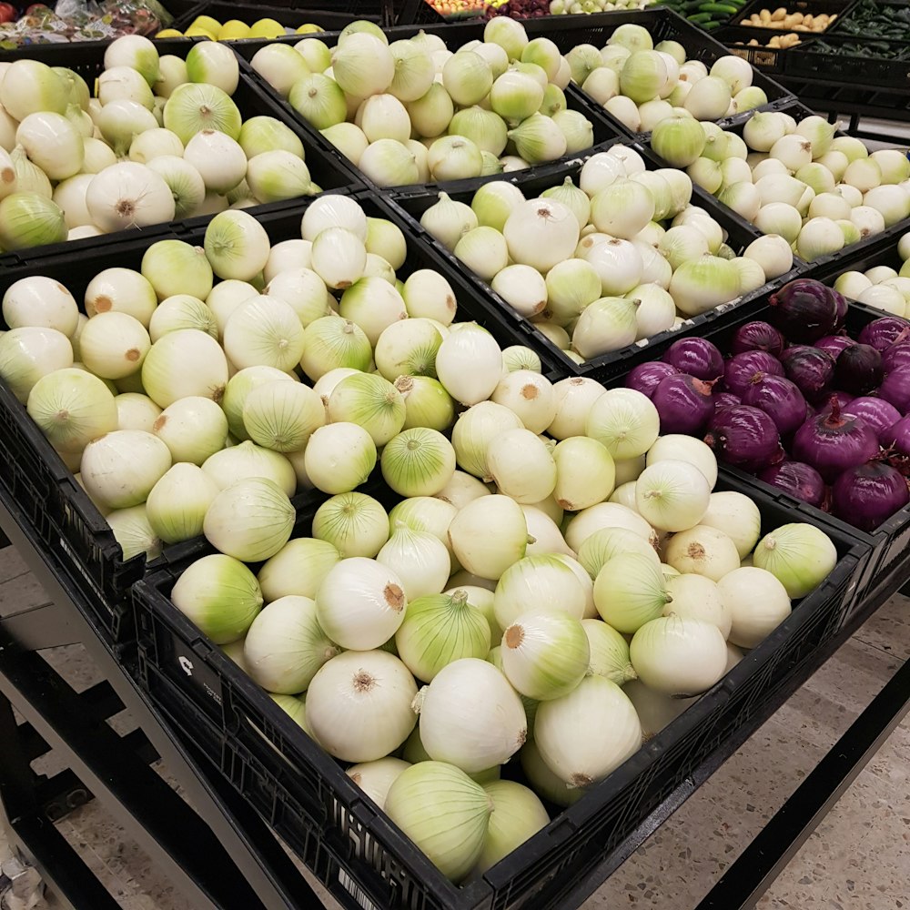 green and red apples on blue plastic crate