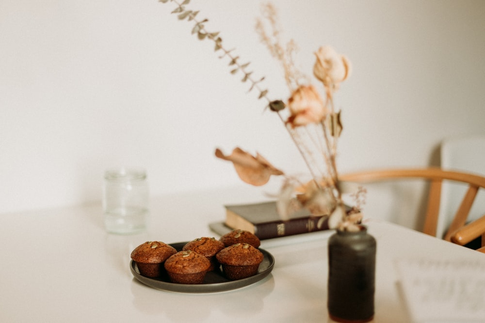 brown and white round cookies on white ceramic plate