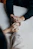 two people holding hands on table in comfort