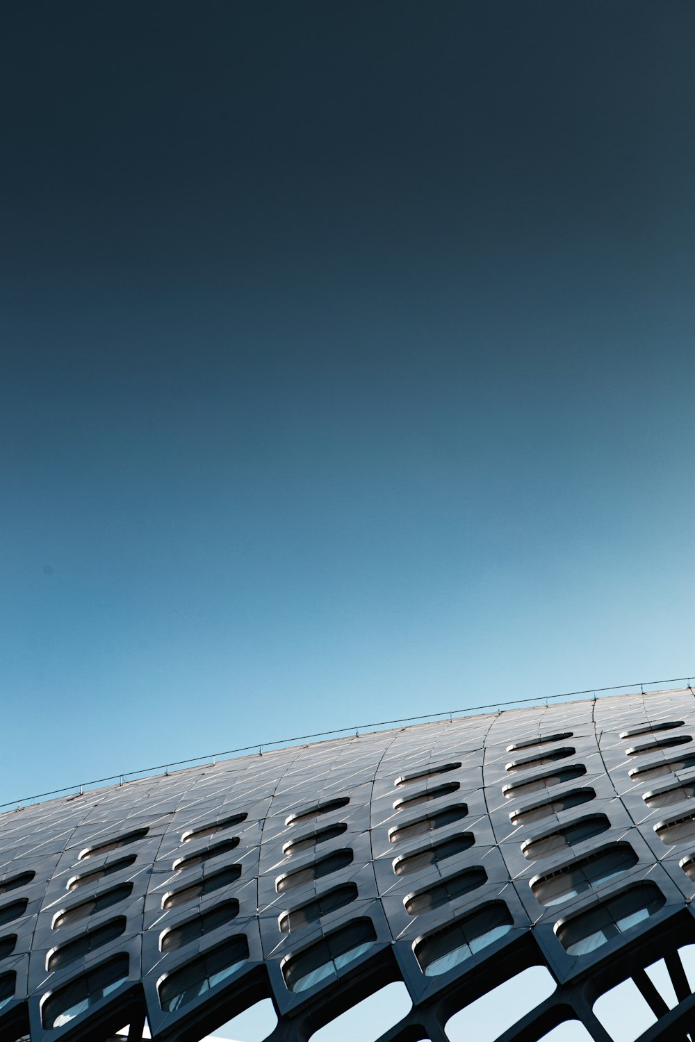 white concrete building under blue sky during daytime