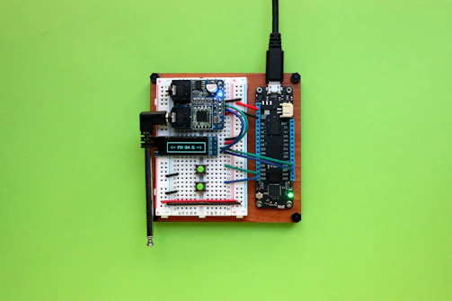 Colorful display of agri-tech DIY kits with ESP32 and Raspberry Pi Pico components.