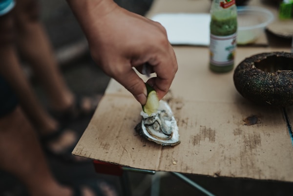 Person holding a sliced of cake